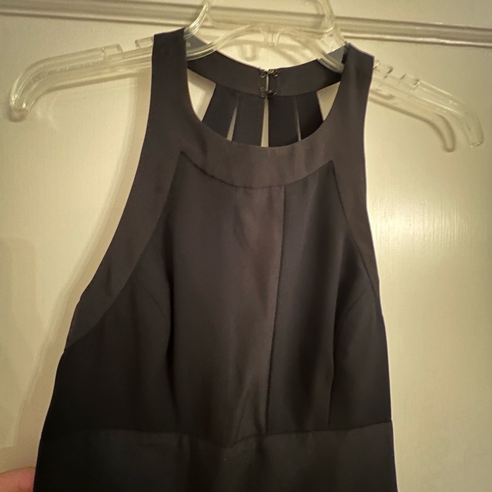 Black cocktail dress with back detail